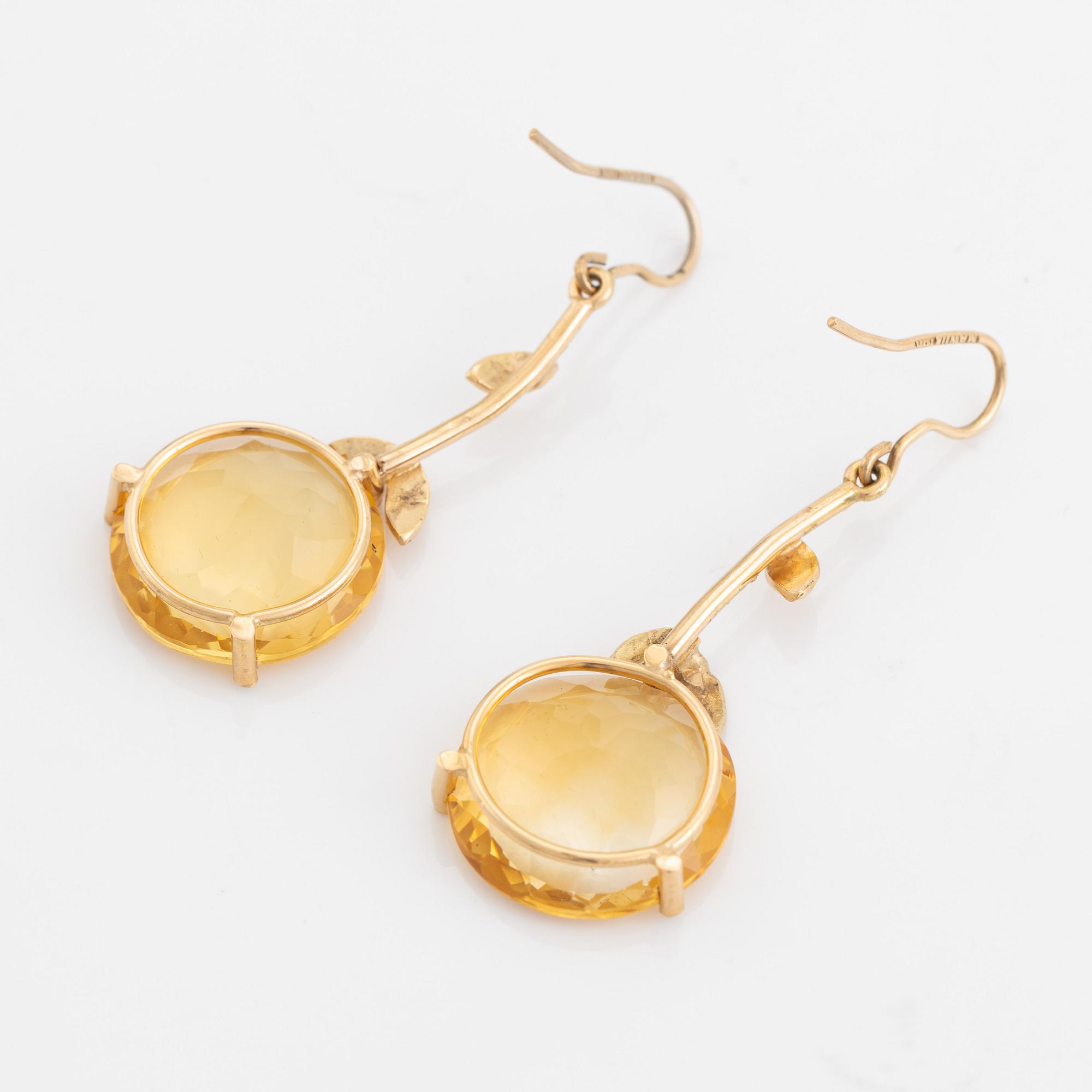 Large citrine and brilliant cut diamond earrings.