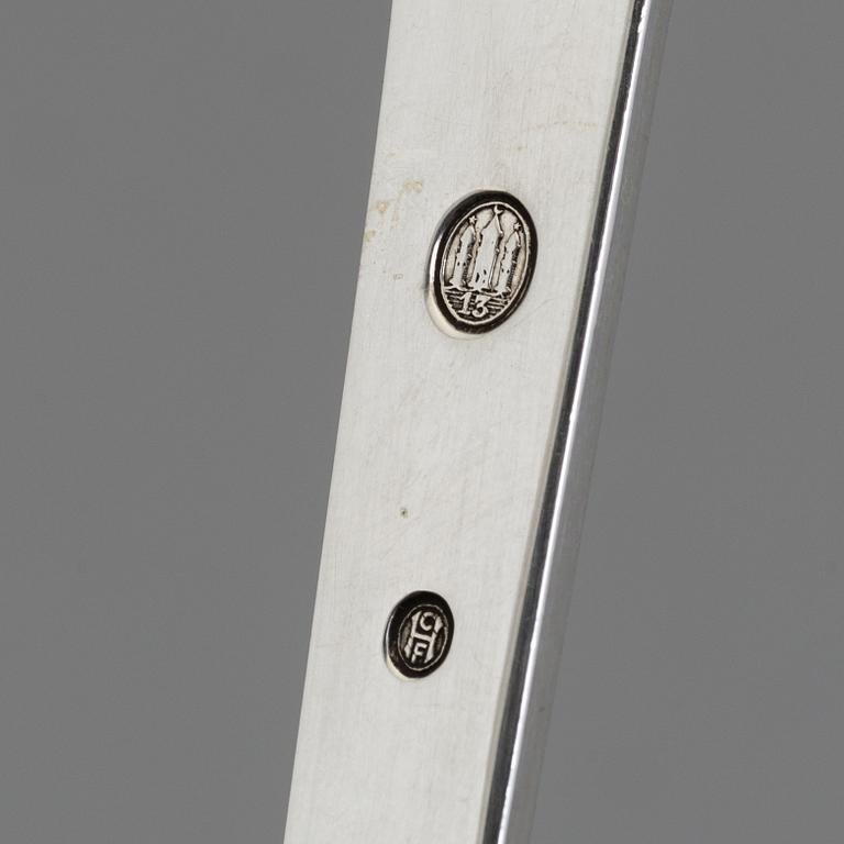 A two-piece Danish Art Nouveau silver serving set, design Thorvald Bindesbøll, maker's mark Rasmus Jensen, Horsens 1913.
