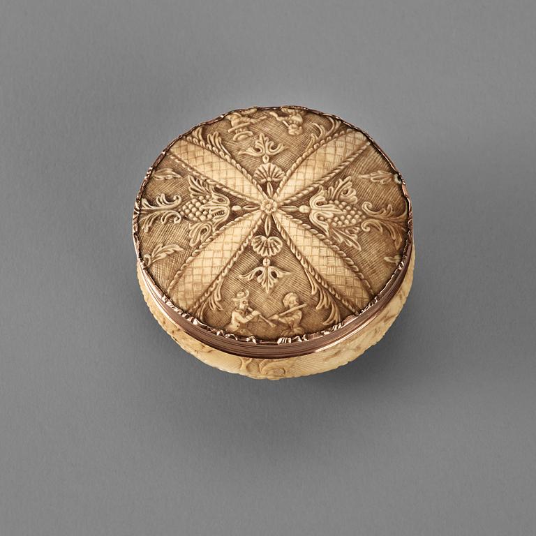 An 18th century bone and gold snuff-box.