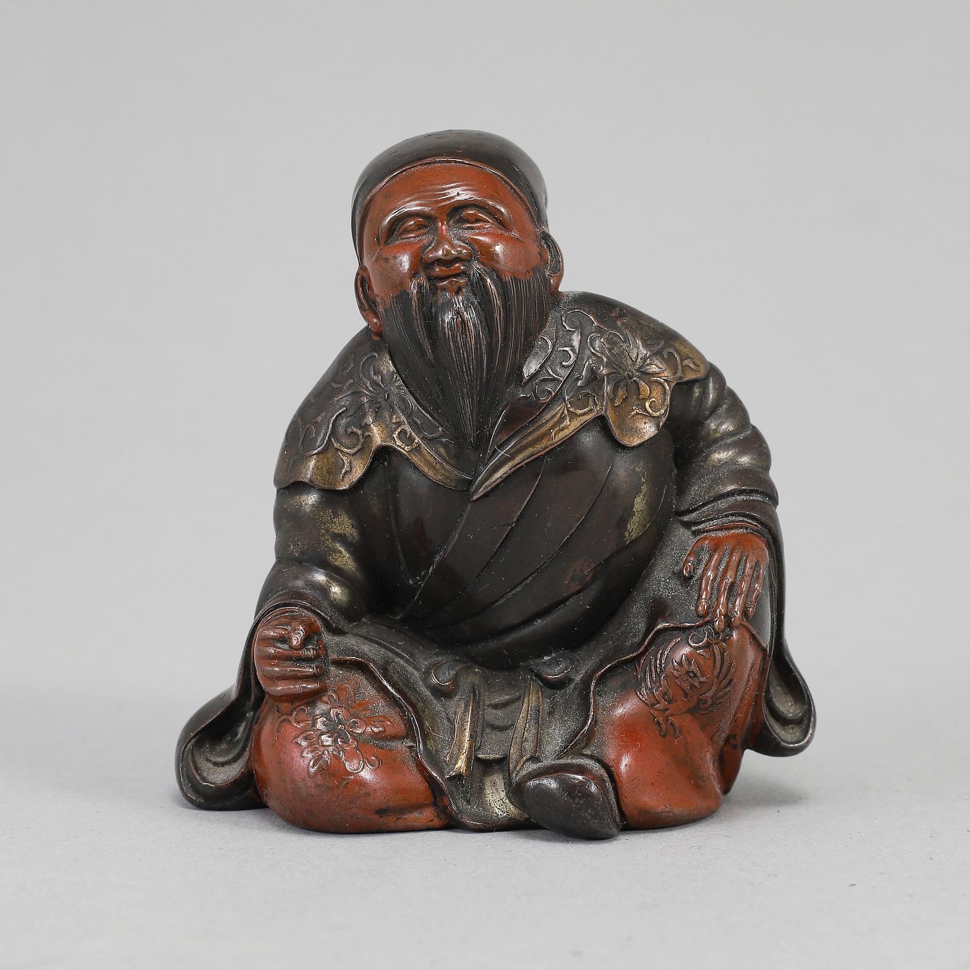 A Japanese silvered bronze figure, Meiji period (1868-1912).