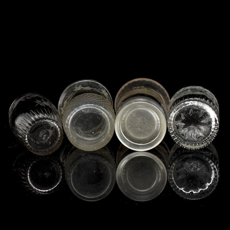 A set of four odd beaker glases, 19th Century.