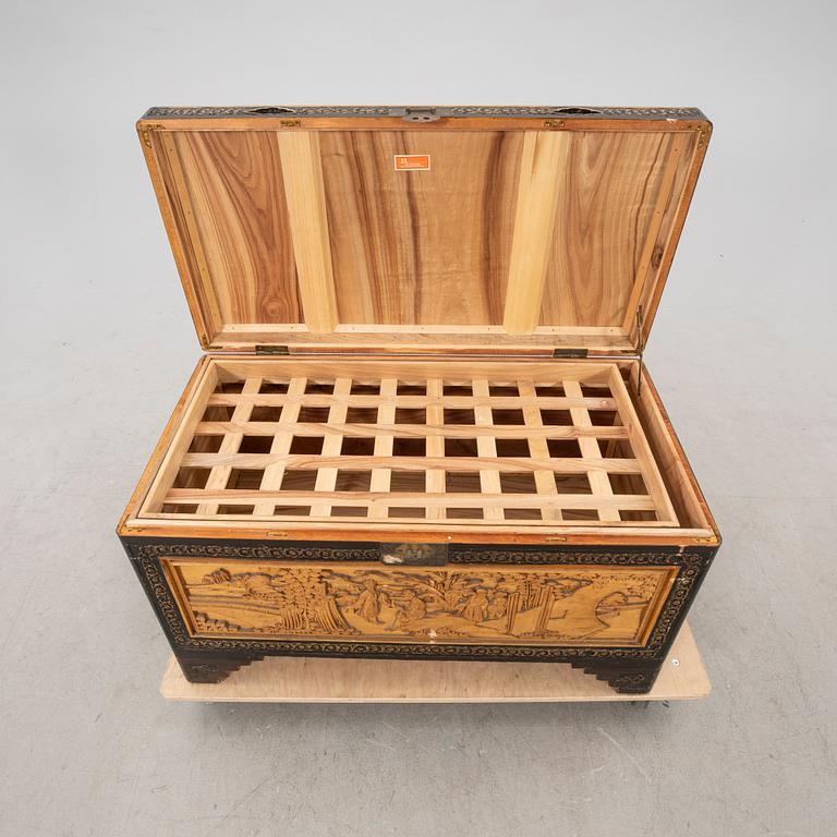 An Asian wooden coffin 20th century.