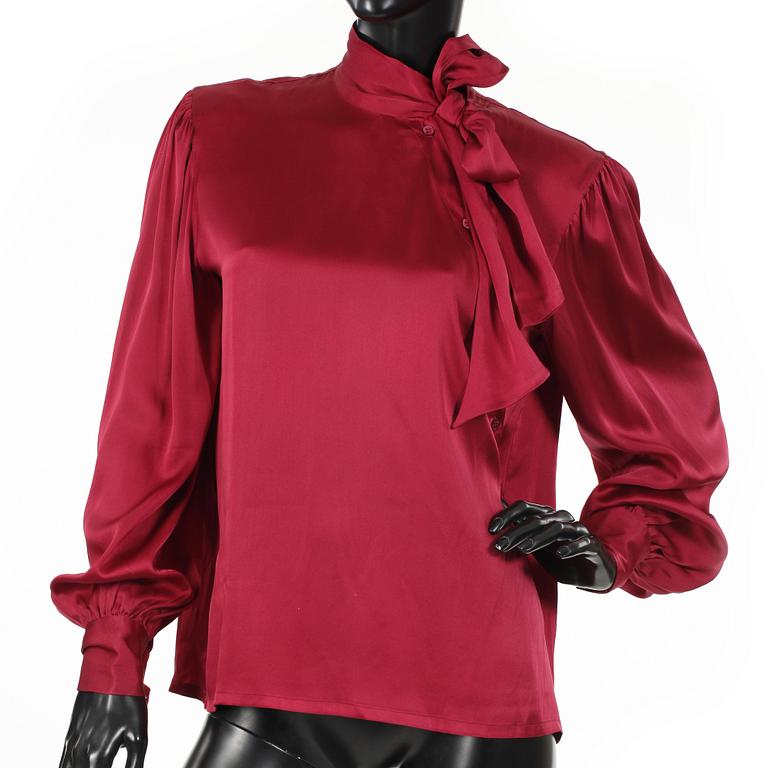 YVES SAINT LAURENT and GUY LAROCHE, three silk blouses.