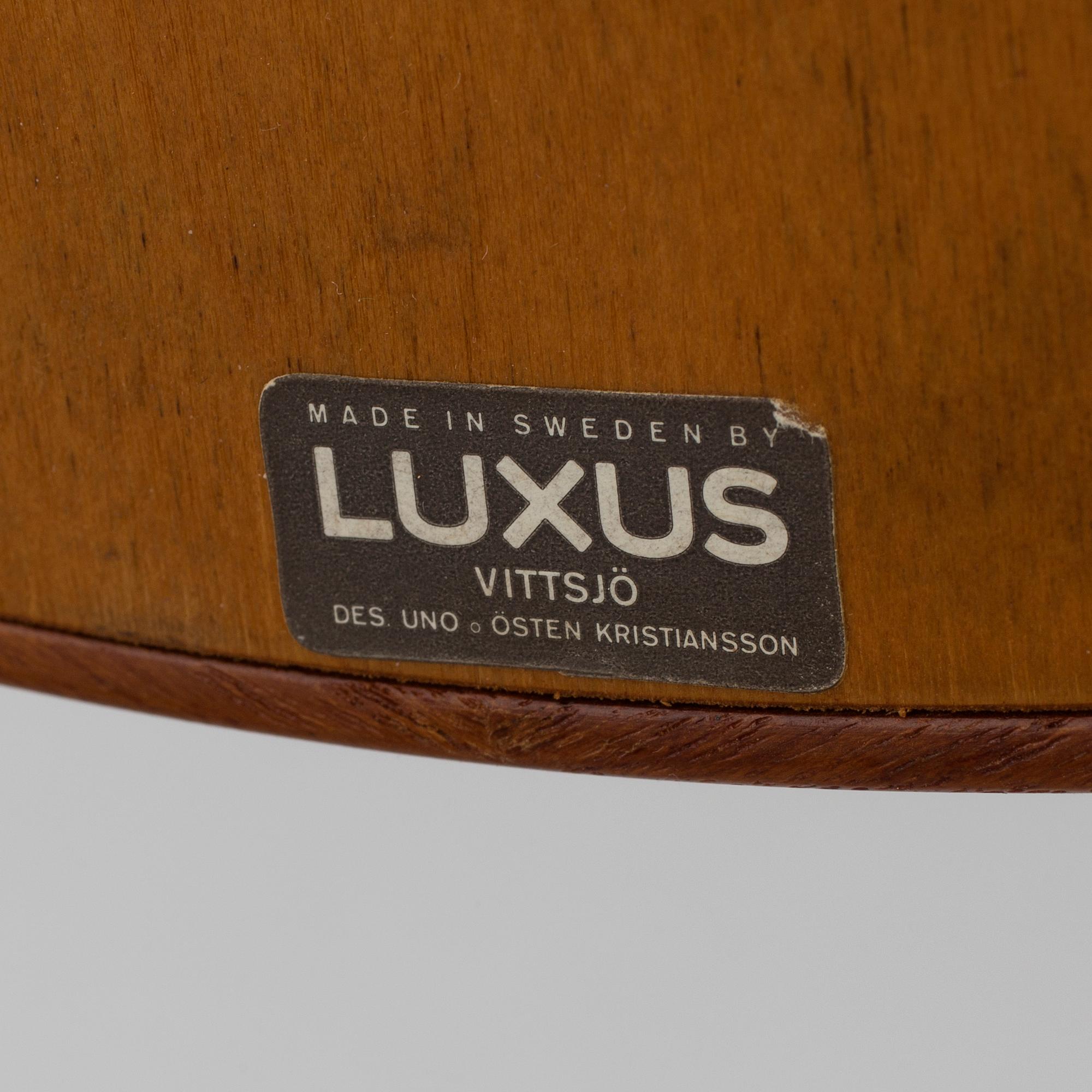 A teak table mirror by Uno and Östen Kristiansson for Luxus, Vittsjö.