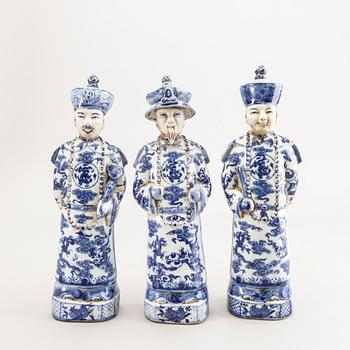 A set of three Chinese porcelain figurines.