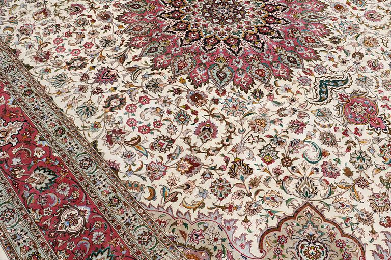 A carpet, Tabriz part silk, so called 50 Raj, cm 400 x 300 cm.