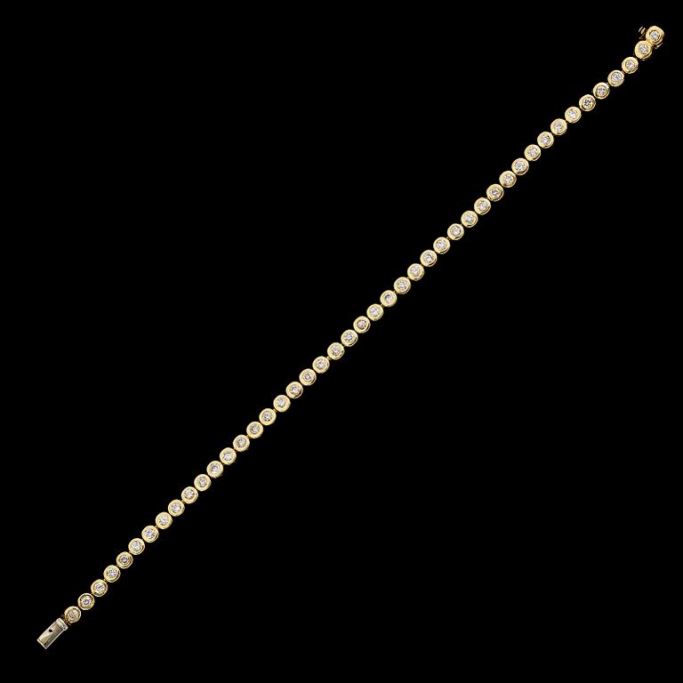 ARMBAND, 18 k guld, briljantslipade diamanter tot ca 3,15 ct.