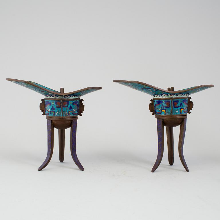 A pair of chinese cloisonné tripod wine vessels, 20th century.