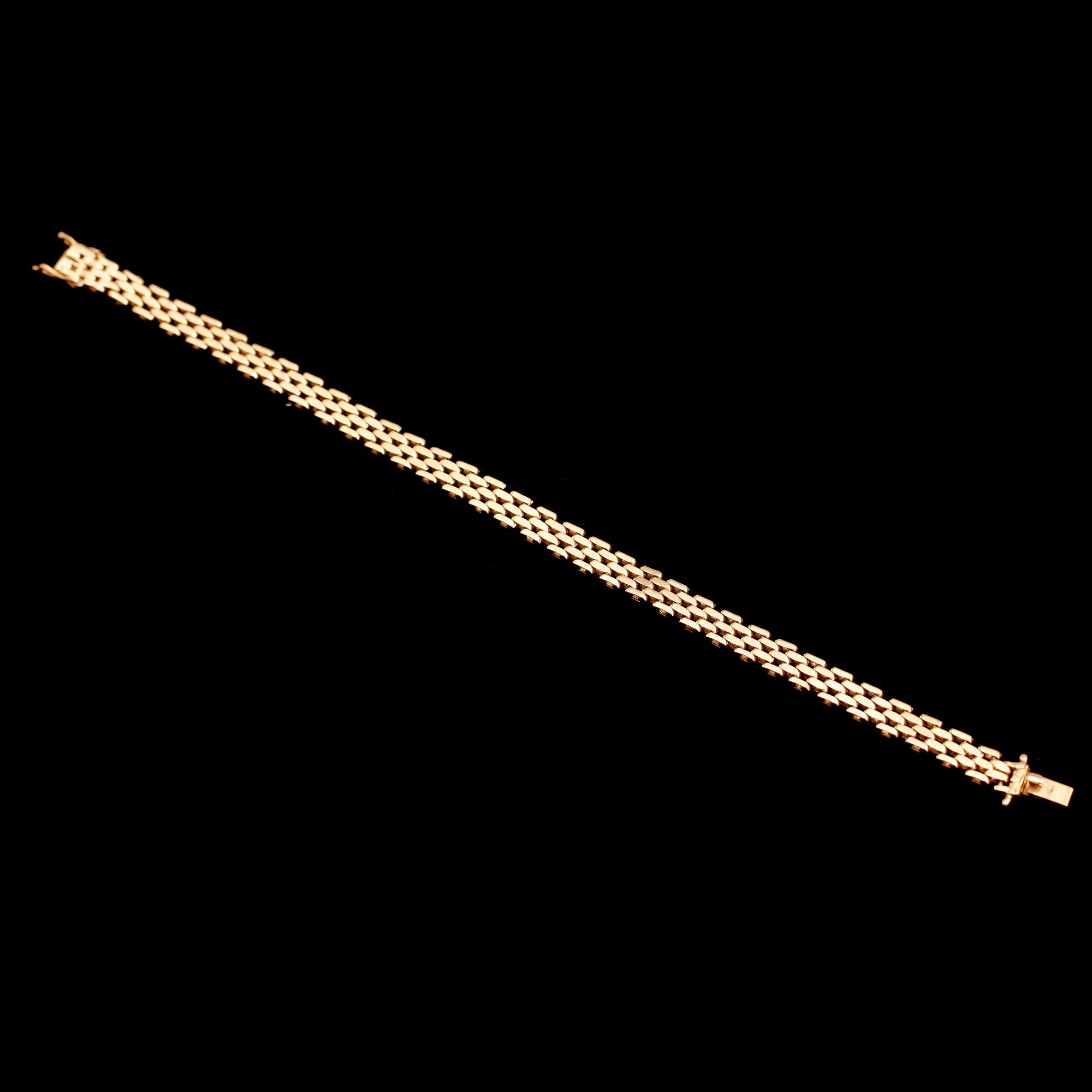 ARMBAND, 18 k guld, 1930. Vikt 13 g.