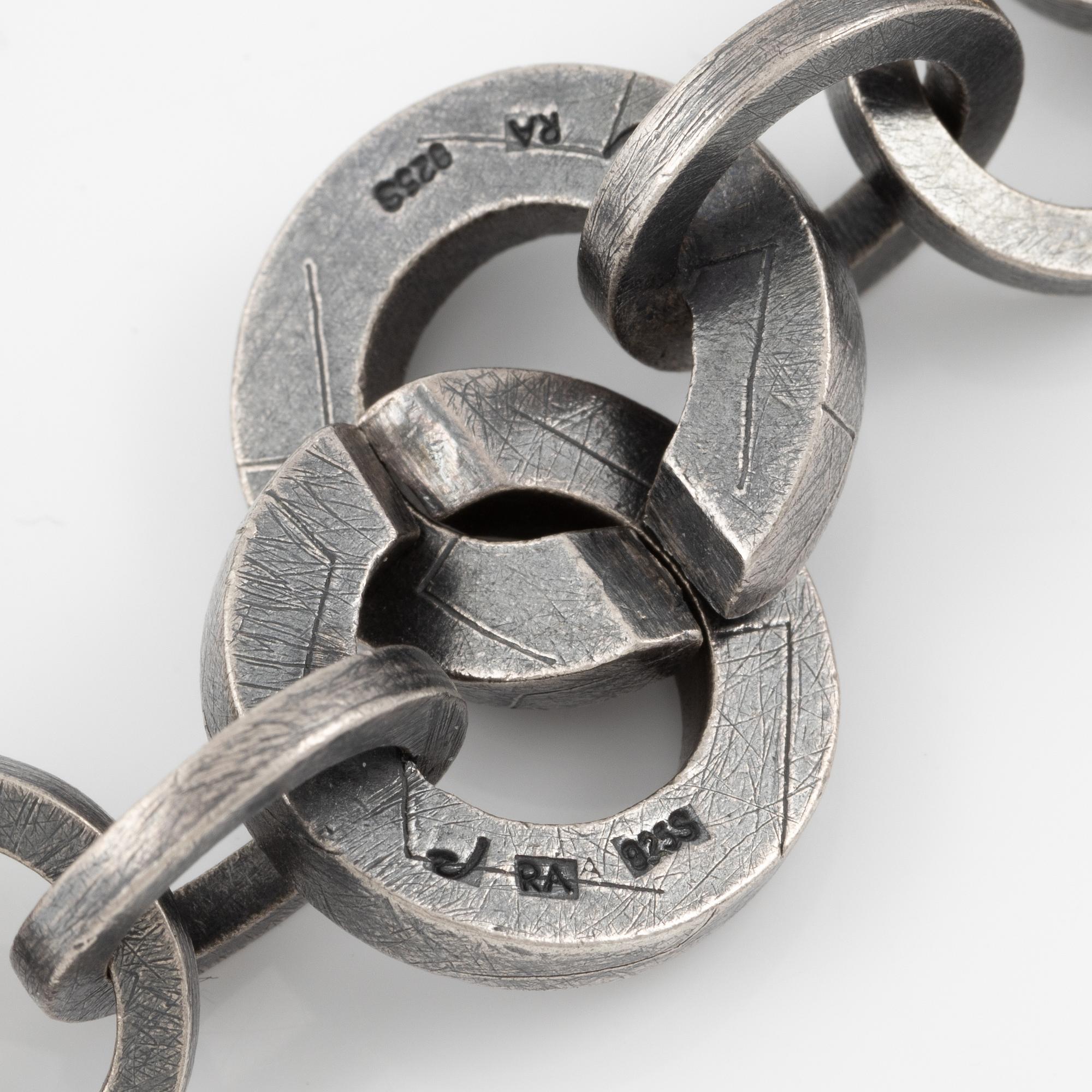 Bracelet, necklace, a pair of earrings, and a ring, Pia Rauff, silver with small diamonds.