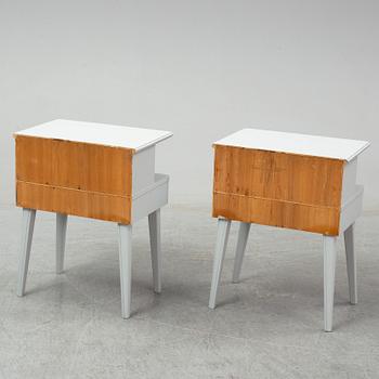 A pair of mid 20th century bedside tables.