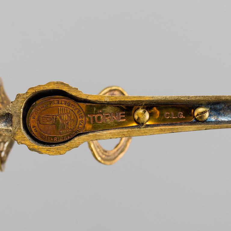 A pair of brass 'Törne' wall sconce, Ikeas 18th century Swedish Furniture series.