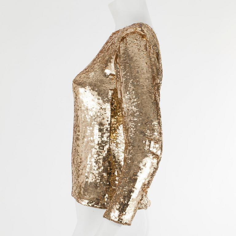 YVES SAINT LAURENT, a golden tinsel eveningjacket, size small.