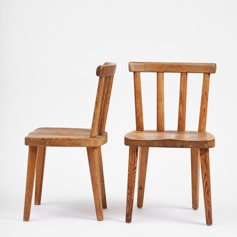Axel Einar Hjorth, a set of seven stained pine "Utö" chairs, Nordiska Kompaniet, Sweden, 1930s.