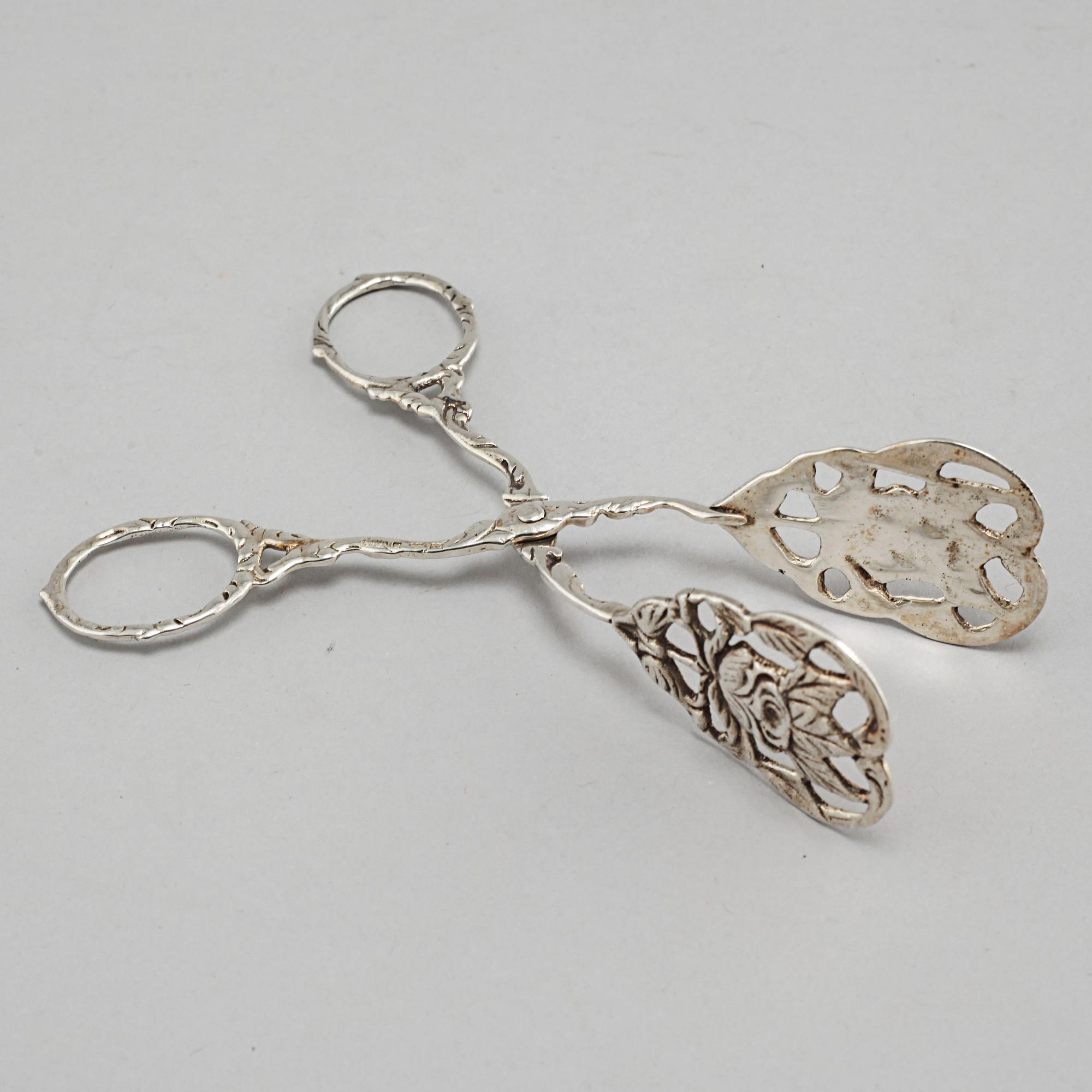 A silver sugarbowl, a cream jug and a tray by J L Hultman, Stockholm, mid 20th century.