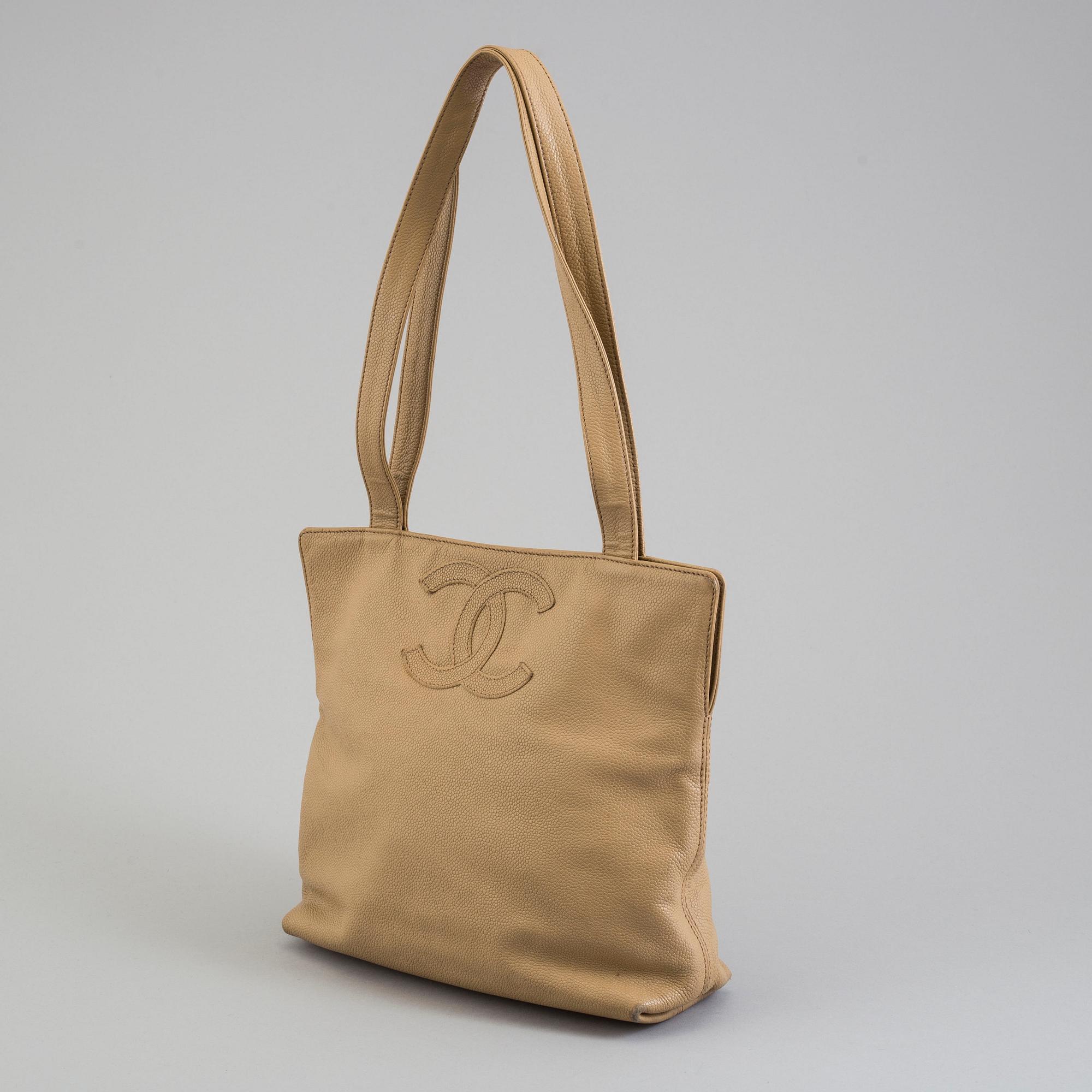 a CHANEL caviar leather bag.