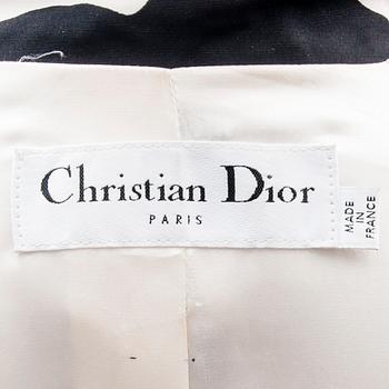 TAKKI, Christian Dior.