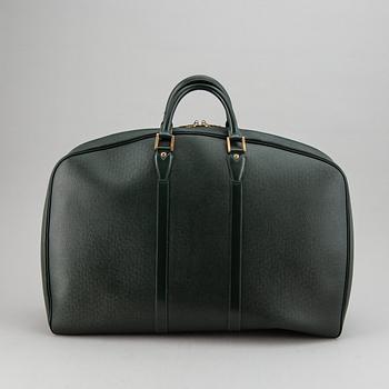 LOUIS VUITTON, 'Helanga' weekendbag with garment cover.