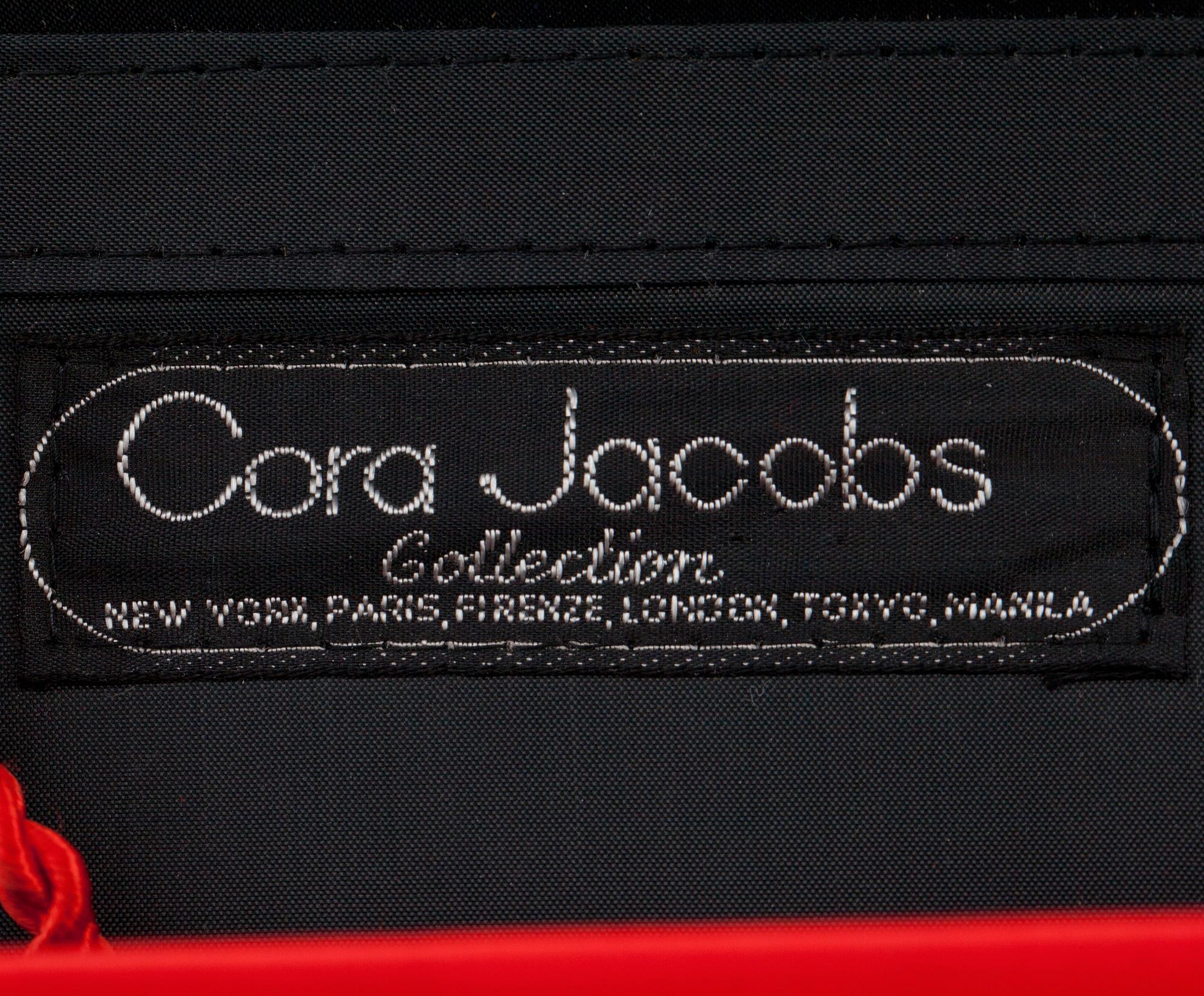 CORA JACOBS, a red silk and embossed leather clutch / evening bag.