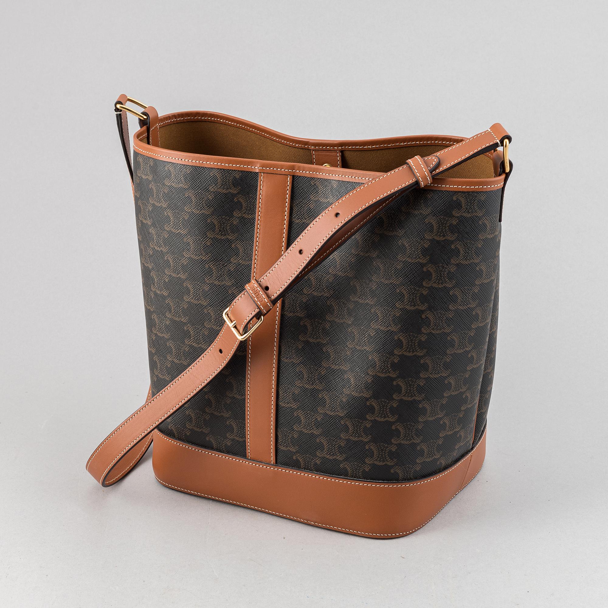 Céline, a canvas and leather handbag and wallet, 2020.