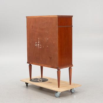 A cabinet, mid 20th Century.