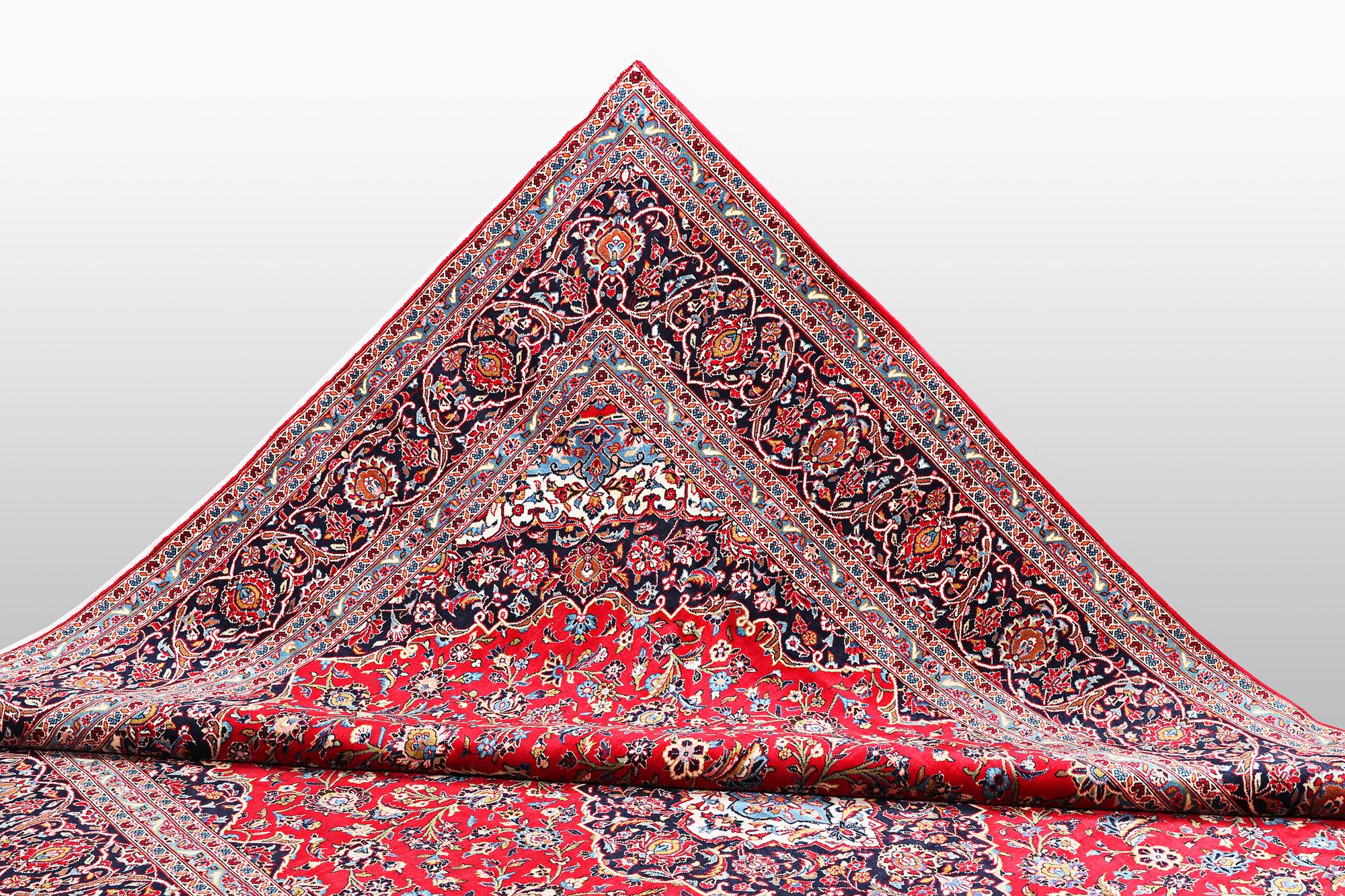 A carpet, Kashan, ca 384 x 295 cm.