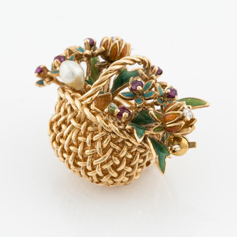 A basket brooch in 18K gold and enamel with diamonds designed by Barbro Littmarck, W.A. Bolin Stockholm 1950.