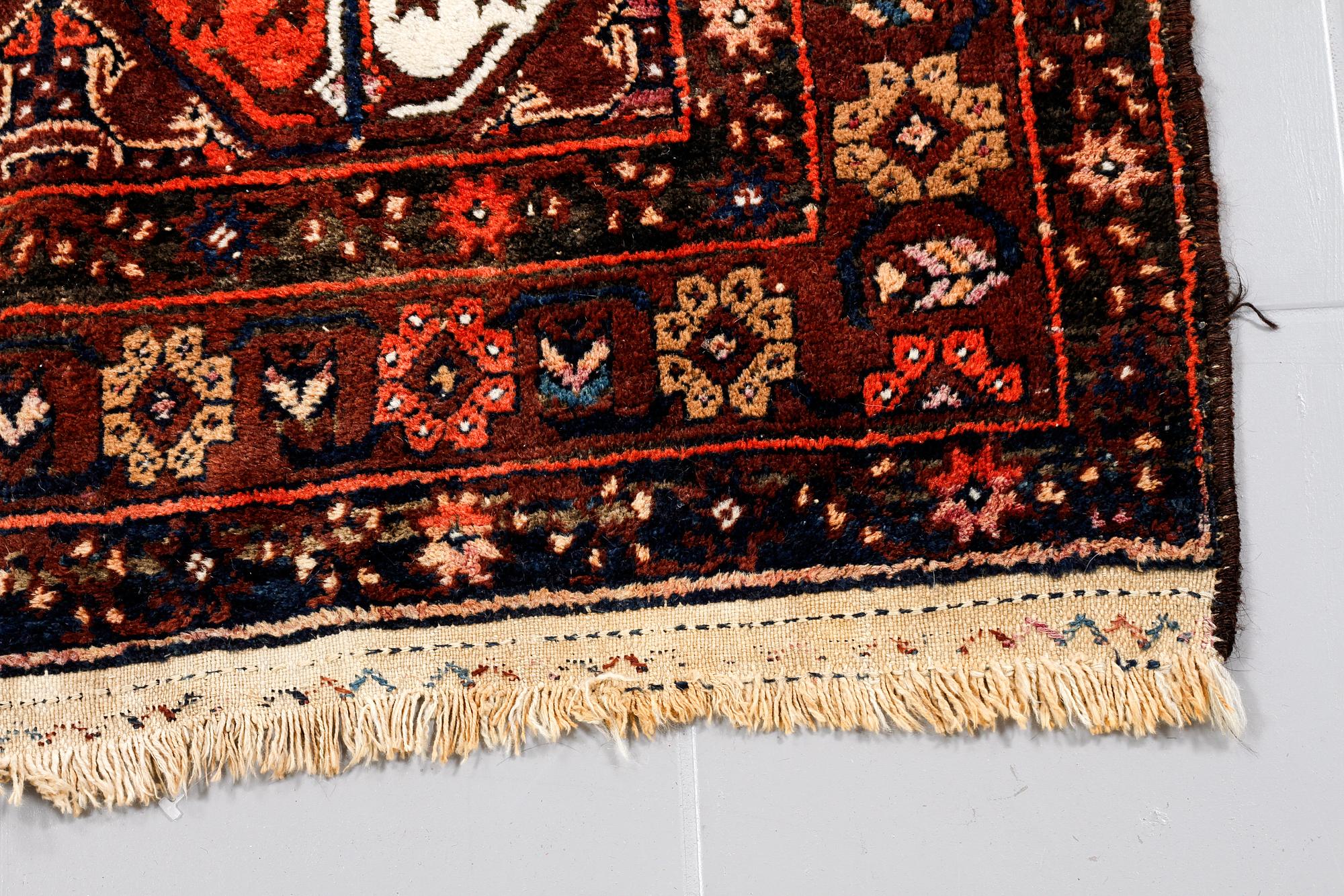 A SEMI ANTIQUE QUCHAN/KURDISH RUG, 248 x 134 cm.