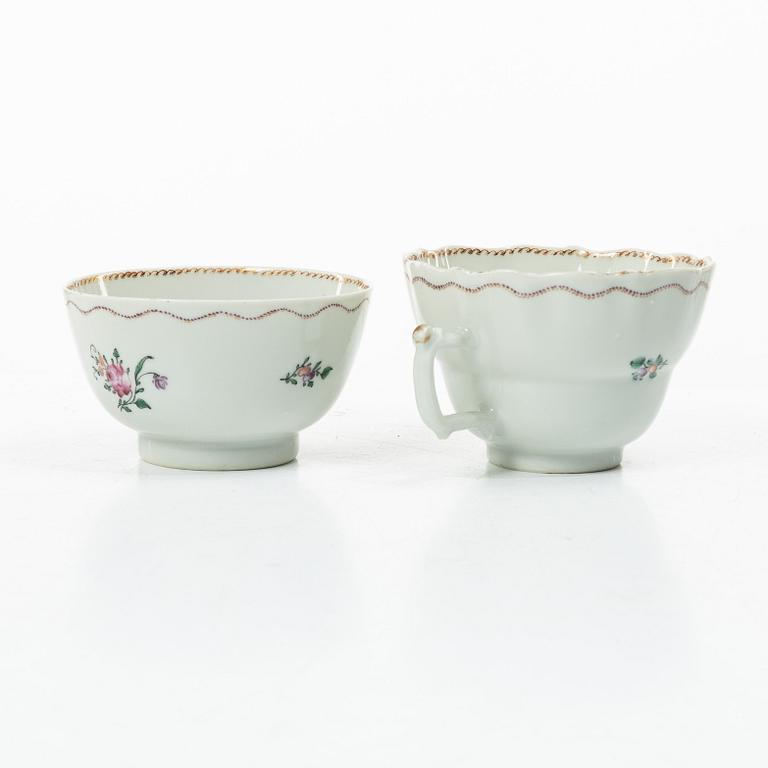Cups and saucers, 11+7, and a teapot in famille rose with monogram, company porcelain, China, 18th century.