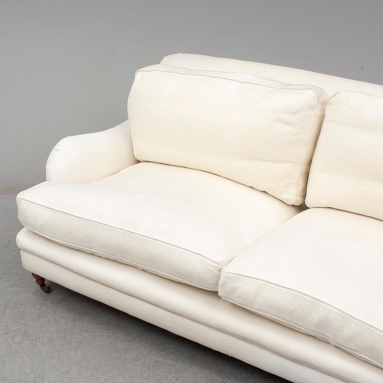 A contemporary Howard sofa.