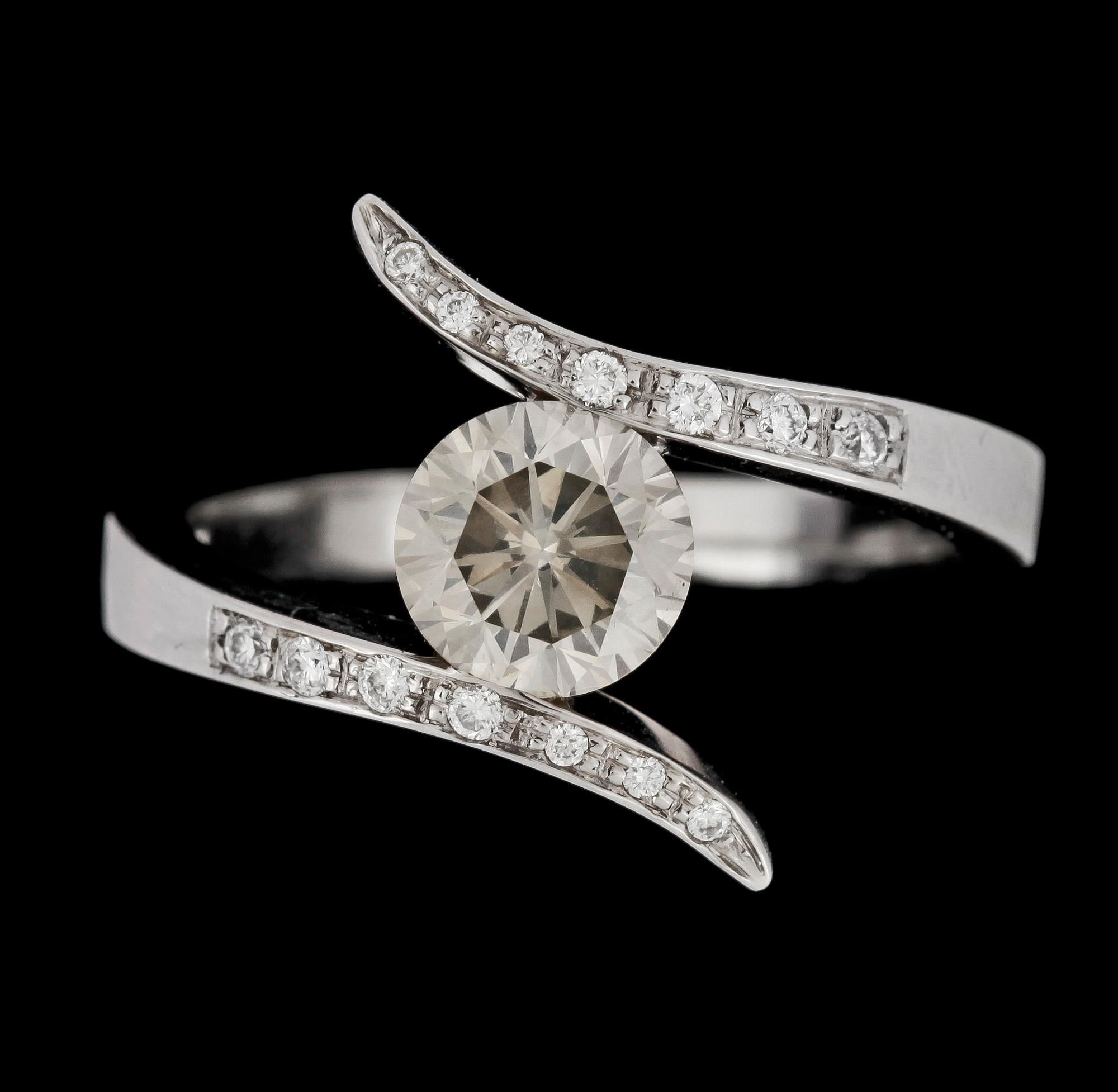 RING, 18k vitguld m briljantslipad diamant light brown ca1,20ct o diamanter tot ca0,14ct. BWG, Stockholm, 2000-tal.