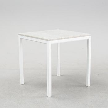A marble top table, 21th century.