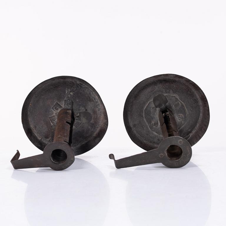 A pair of similar candle holders, 19th century.