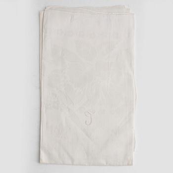 Ten linen damask tea towels, early 20th Century.