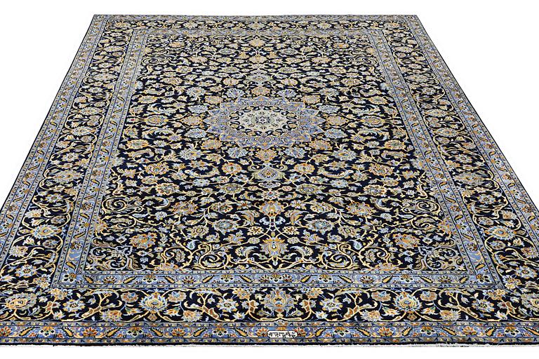 A carpet, Kashan, c. 393 x 297 cm.
