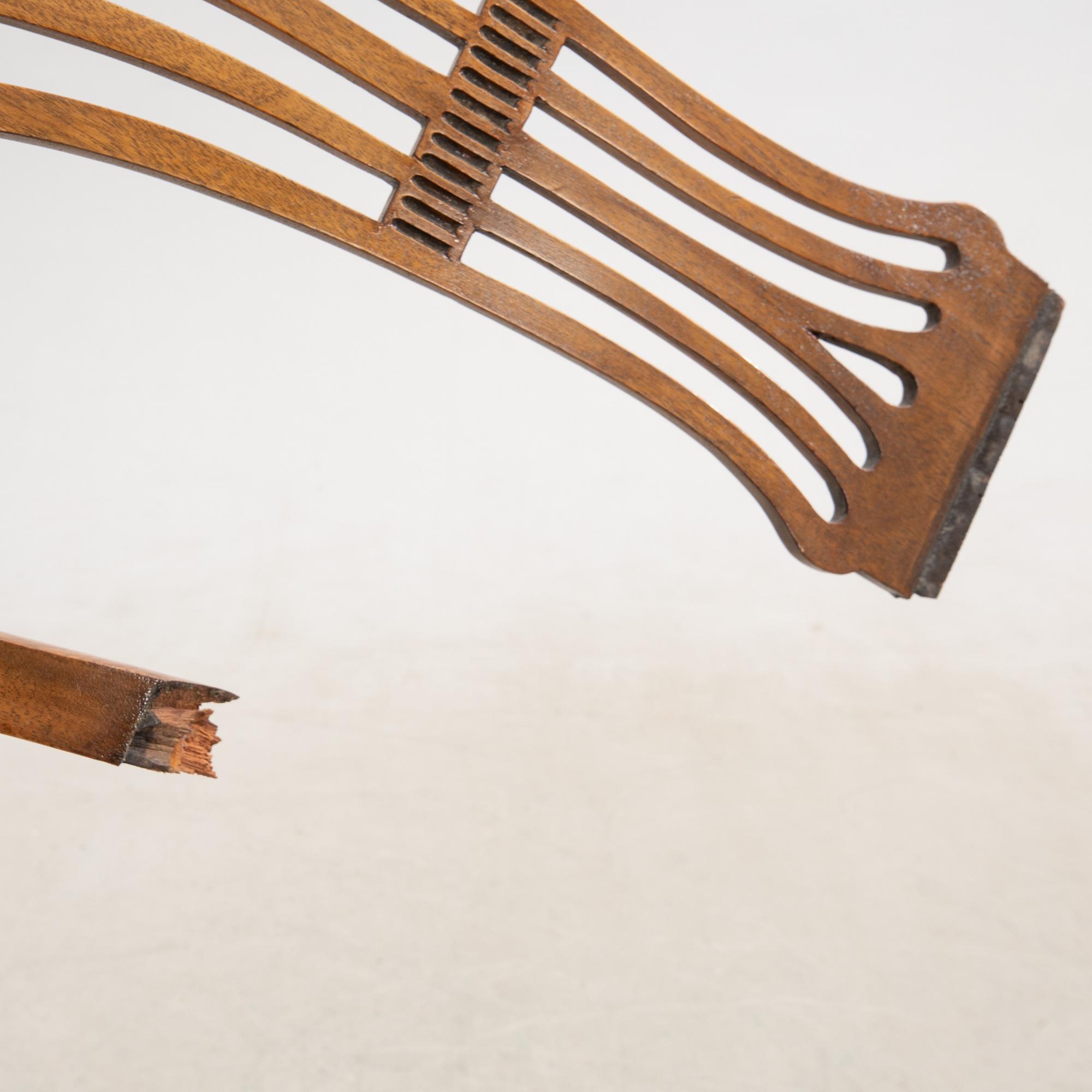 Chairs 10 pcs and armchairs 1 pair Chippendale style England circa 1900.