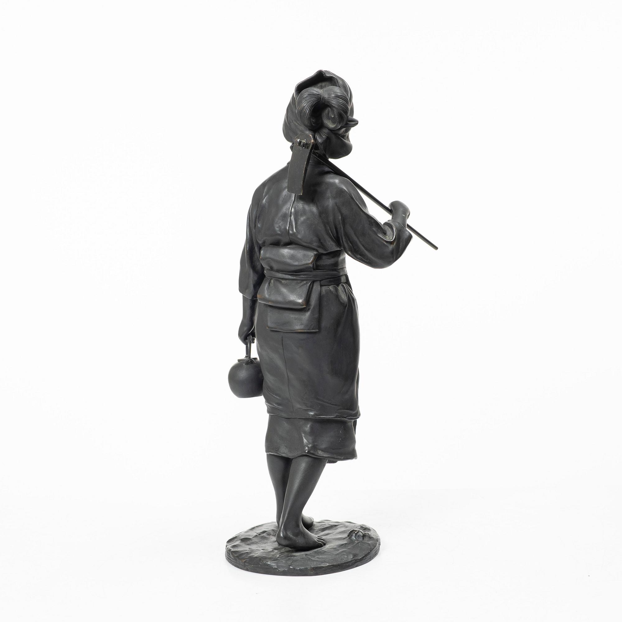 A large Japanese bronze okimono, early 1900s.