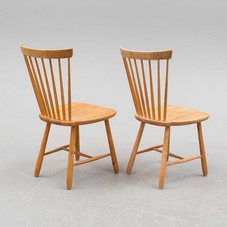 A pair of 'Lilla Åland' chairs by Carl Malmsten, second half of the 20th century.