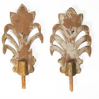 Two pairs of curtain-rod finials, early 19th Century.