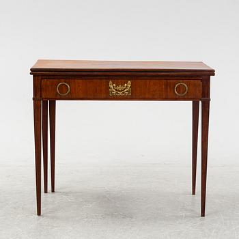 A mahogany-veneered Empire cards table, fist part of the 19th Century.