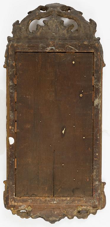 A pair of Swedish rococo two-light girandole mirrors, later part 18th century.