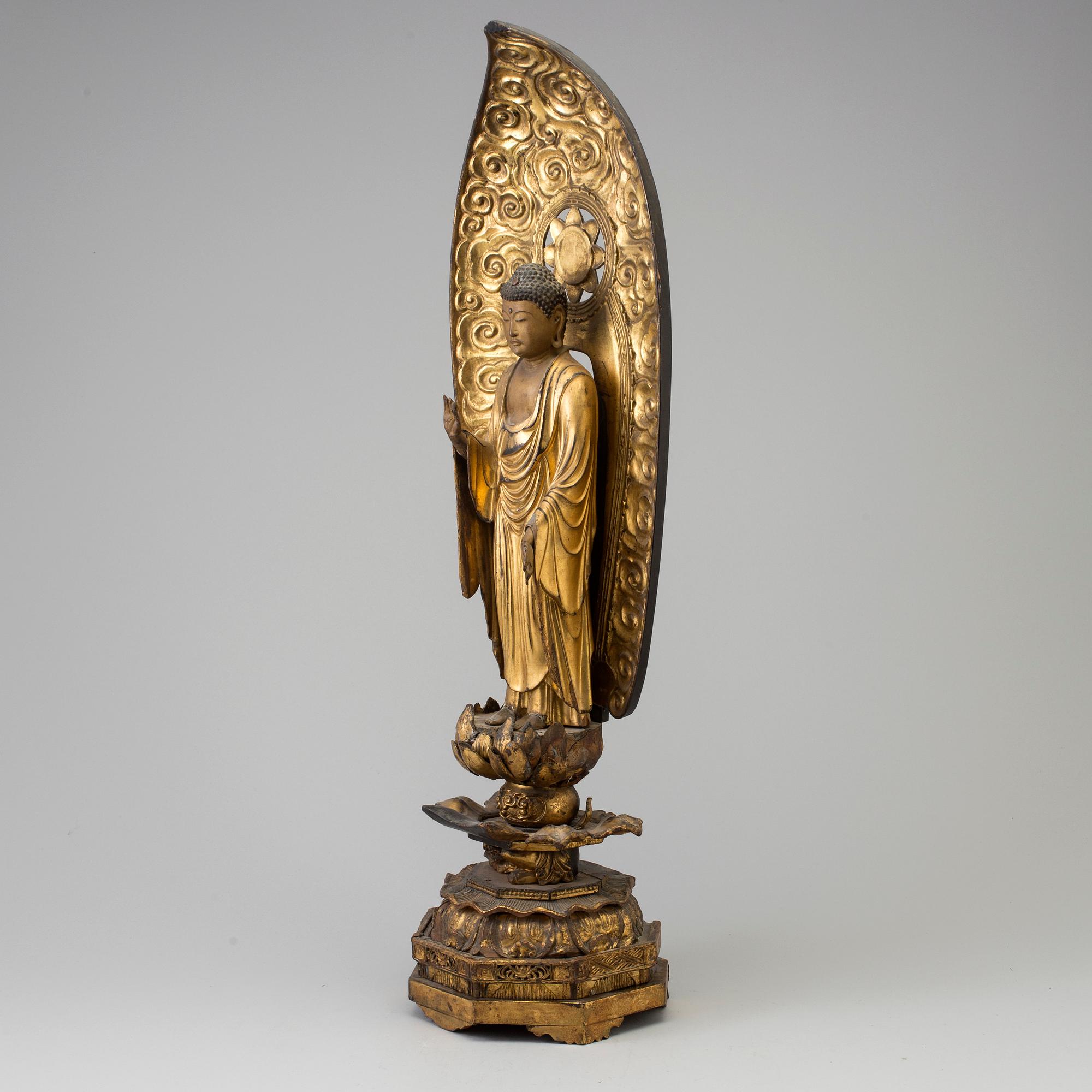 A large wooden lacquered figure of buddha, Japan, 19th Century.