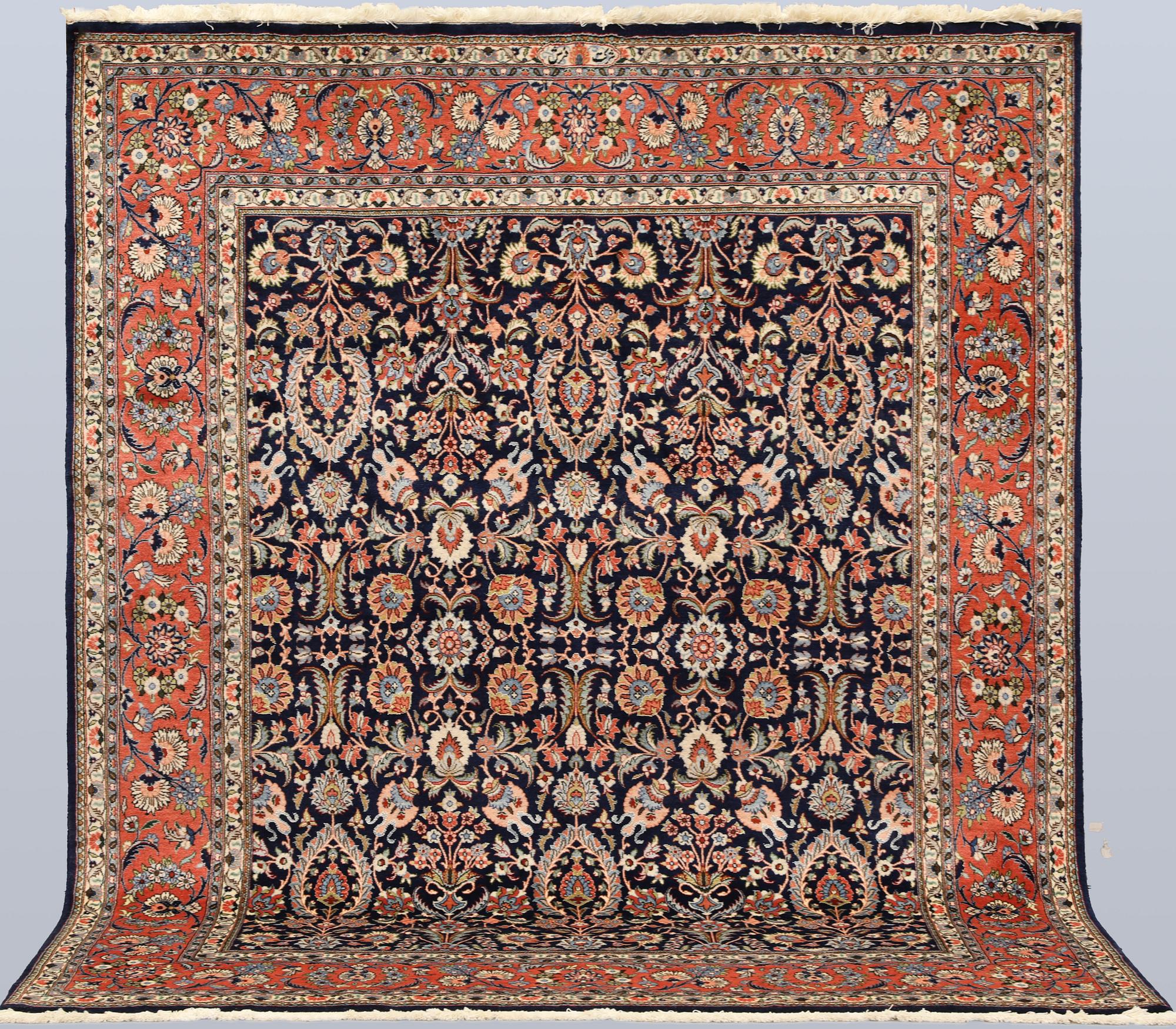 A part silk Sarouk rug, signed, approx. 240 x 208 cm.