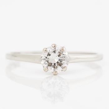 Ring 18K gold with a round brilliant-cut diamond.