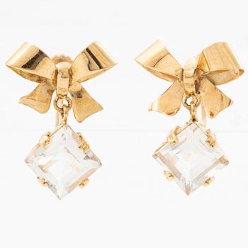 A pair of 18K gold earrings with faceted rock crystal.