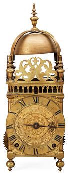 653. An English middle 17th century brass lantern clock signed Thomas Loomes At The Mermayd In Lothbury.