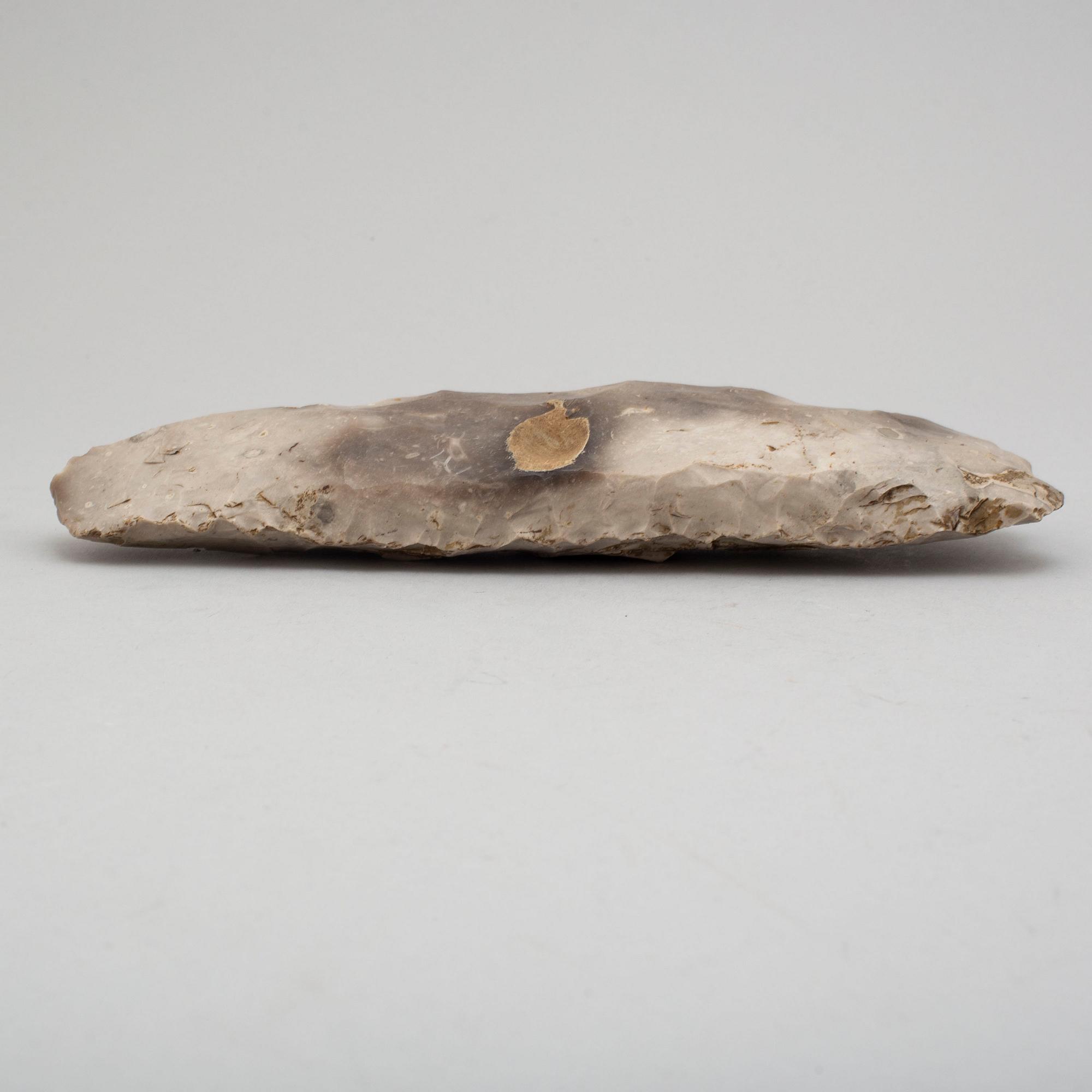 A early-mid neolithic flint axe.