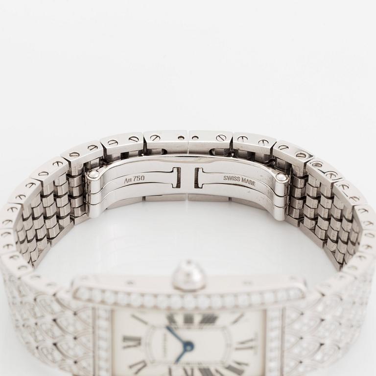A Cartier "Tank Américane" 18K white gold watch set with round brilliant-cut diamonds.