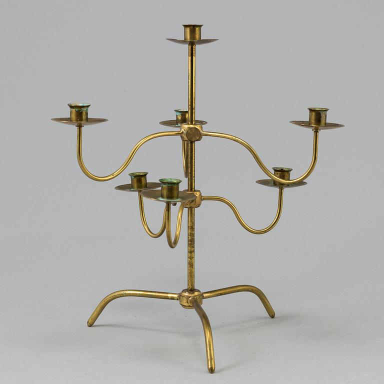 A brass kandelabra model 2454 by Josef  Frank for Firma Svenskt Tenn.