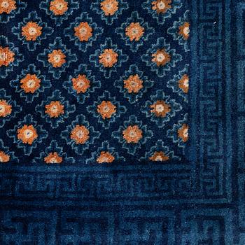 A semi-antique chinese Baotou rug, c 285 x 164 cm.